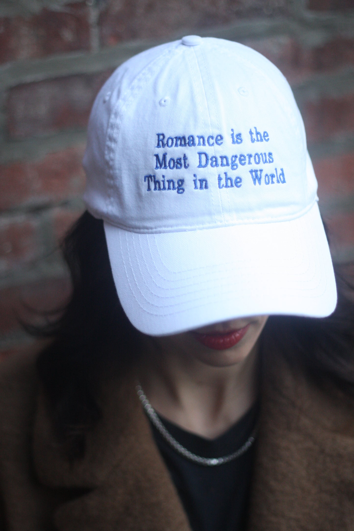 "Romance is the Most Dangerous Thing in the World" hat